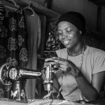 young-african-girl-seewing-on-the-seewing-machine